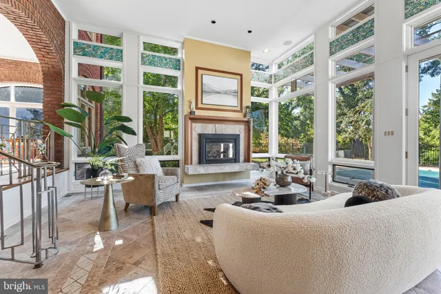 a view of a wooden deck with a yard