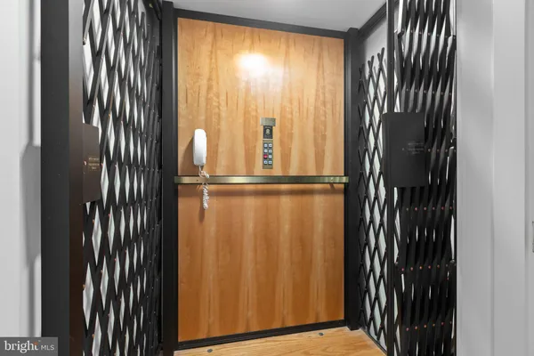 a view of a swimming pool with an outdoor space and seating area