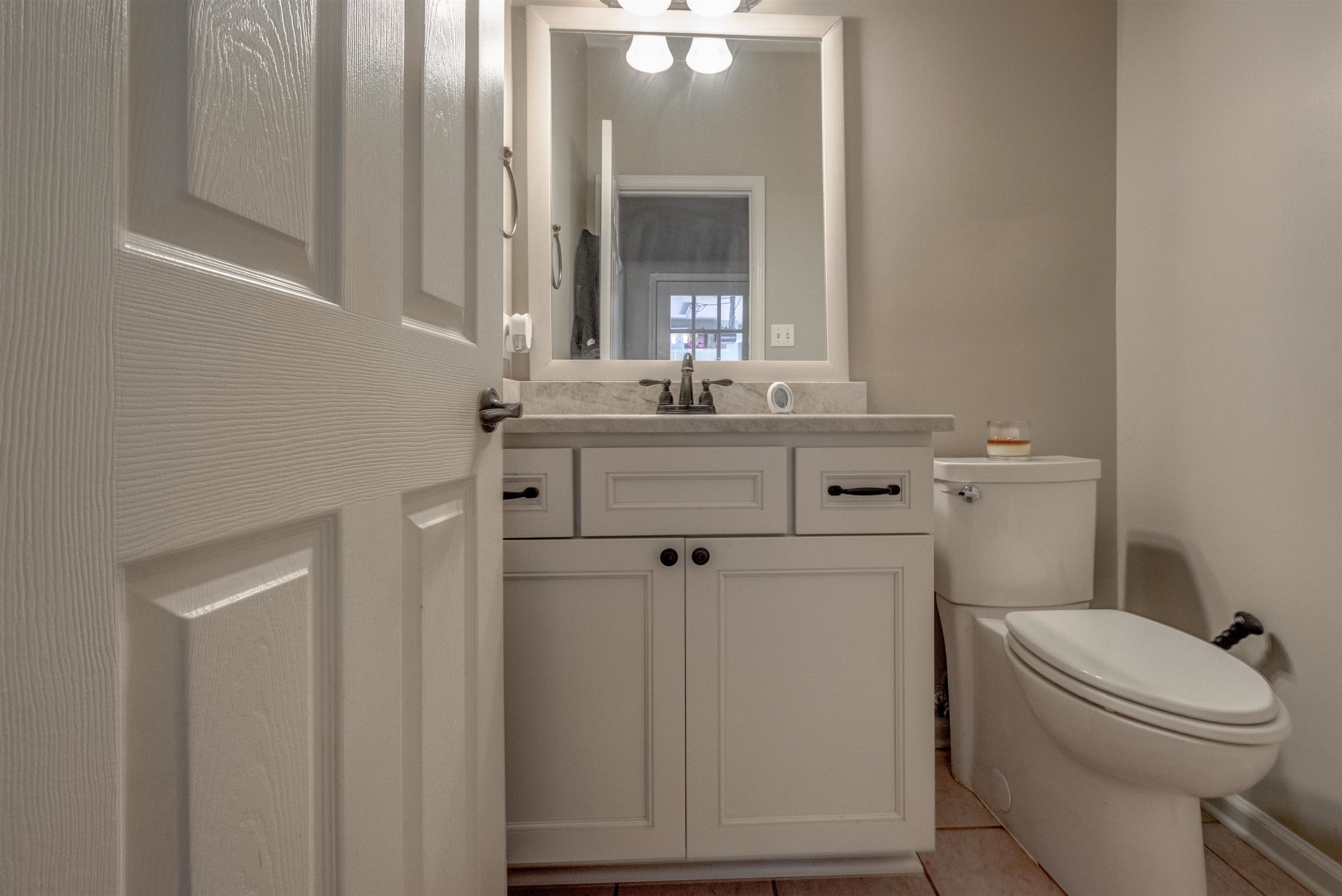 1470 John Ridge Drive Collierville, TN 38017 - Photo 13 of 25 half bath down