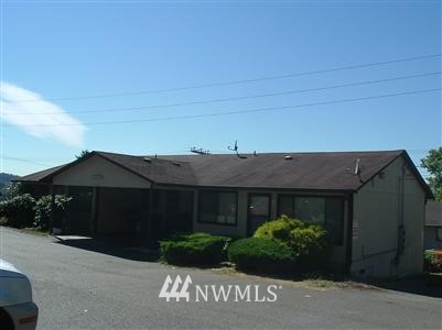 2732 Pine Road Northeast Bremerton, WA 98310 - Photo 1 of 1 a front view of a house with garden