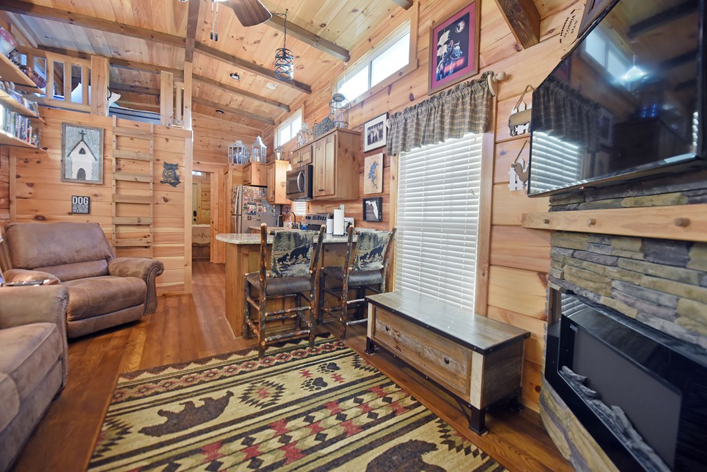 52 Foggy Mountain Road Blairsville, GA 30512 - Photo 18 of 50 a view of a balcony with chairs