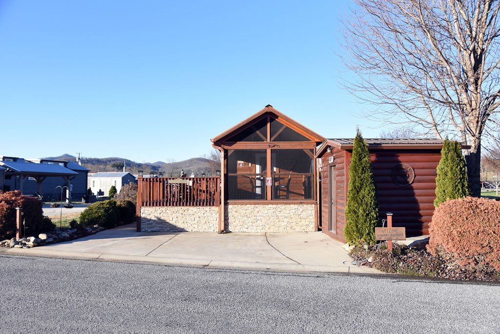 52 Foggy Mountain Road Blairsville, GA 30512 - Photo 35 of 50 a front view of a house with a yard and garage