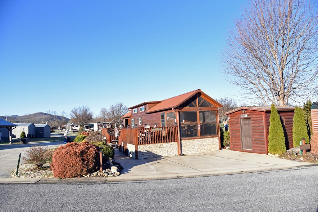 52 Foggy Mountain Road Blairsville, GA 30512 - Photo 8 of 50 a front view of a house with a garage