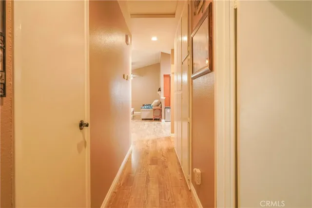 a view of a bathroom from the hallway