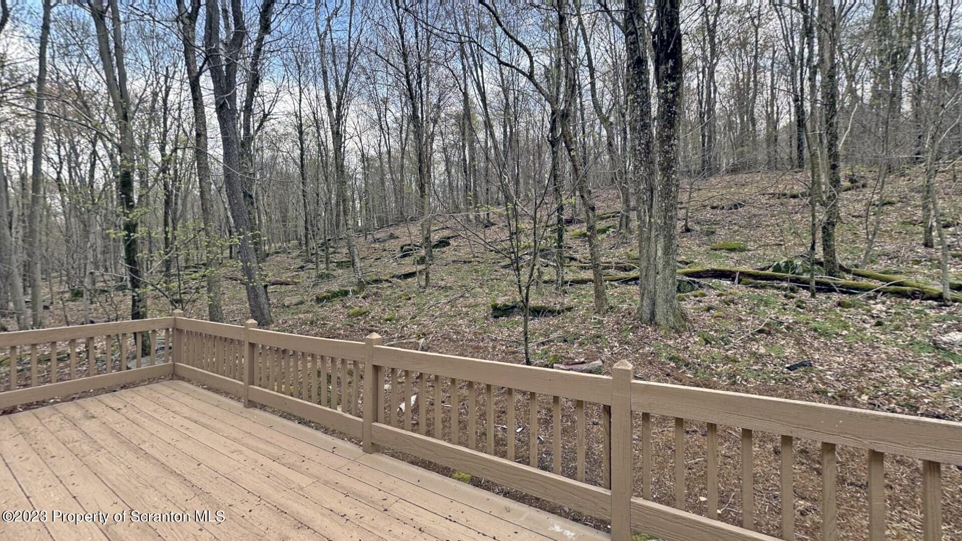 1013 Hemlock Way Newfoundland, PA 18445 - Photo 11 of 44 a view of wooden fence and trees
