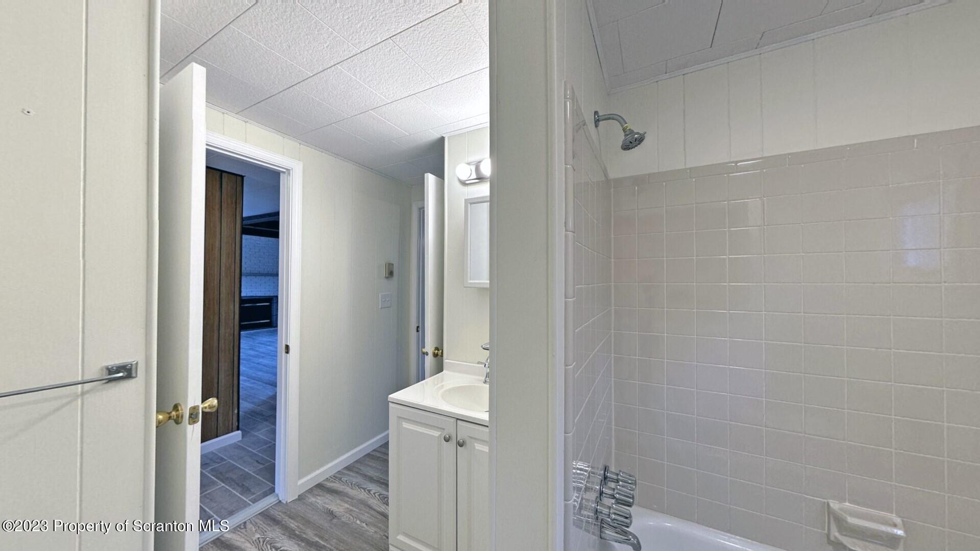 1013 Hemlock Way Newfoundland, PA 18445 - Photo 26 of 44 a bathroom with a bathtub and shower