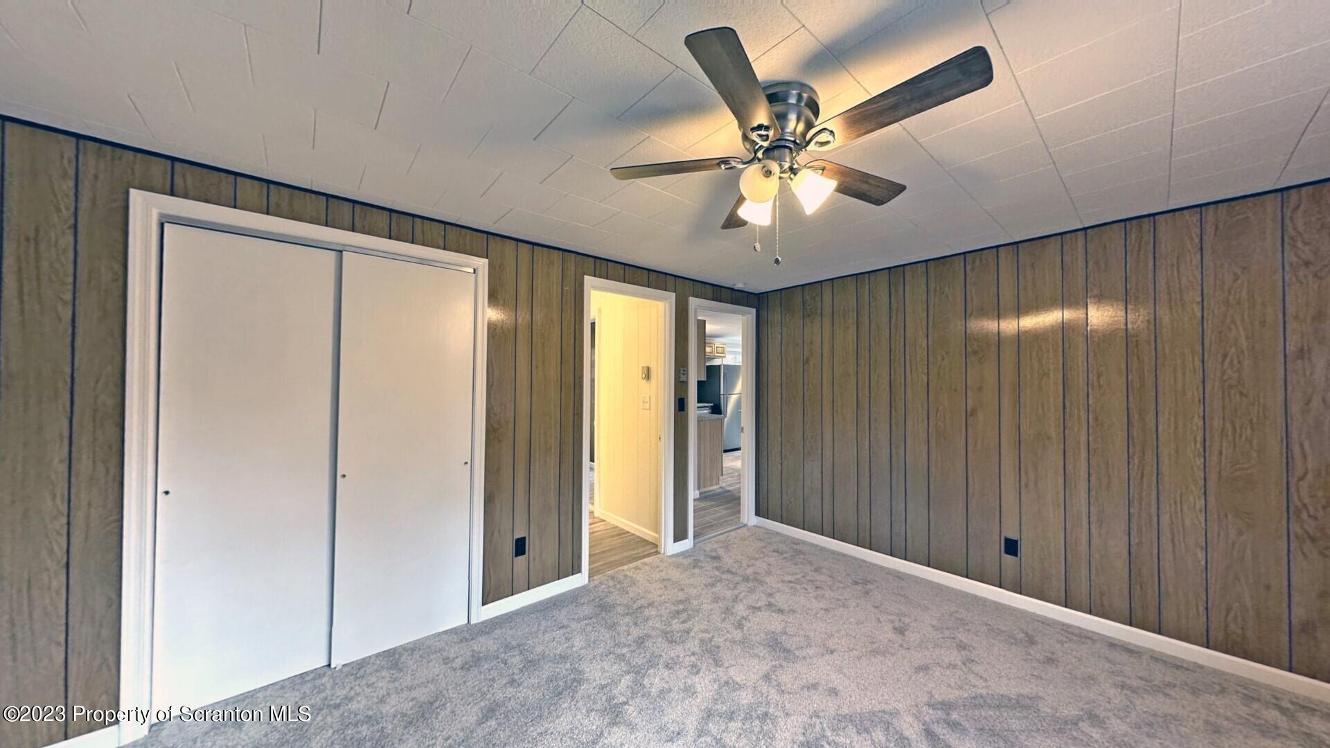 1013 Hemlock Way Newfoundland, PA 18445 - Photo 27 of 44 a view of a livingroom with a ceiling fan and a window