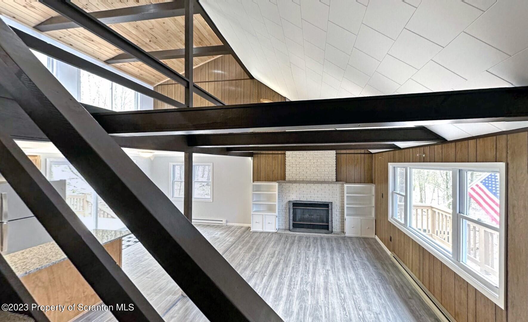 1013 Hemlock Way Newfoundland, PA 18445 - Photo 29 of 44 a view of wooden floor in an empty room