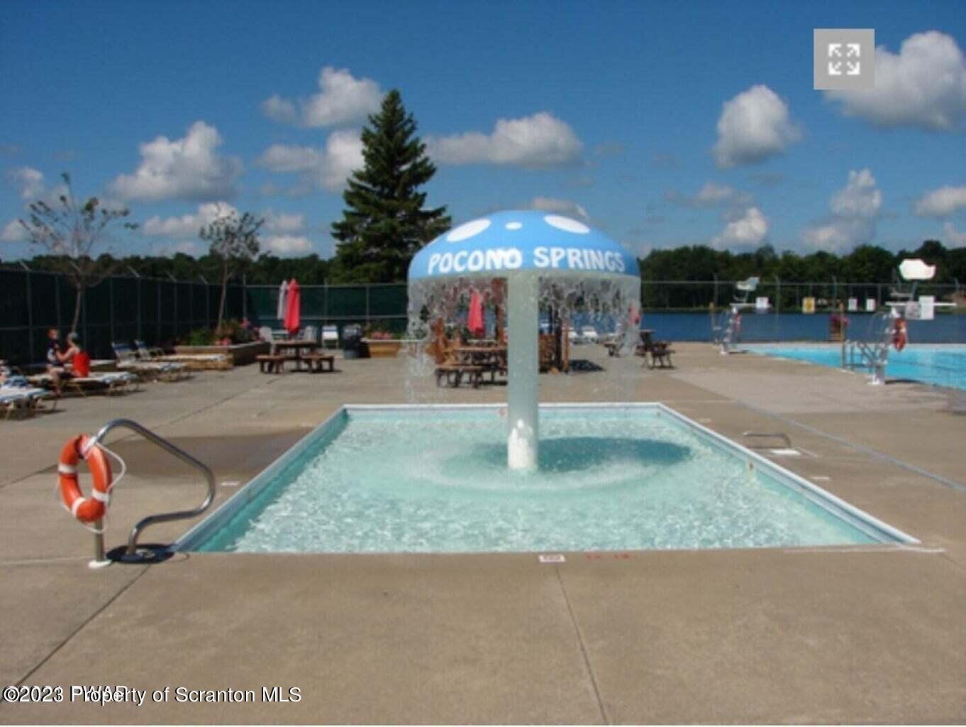 1013 Hemlock Way Newfoundland, PA 18445 - Photo 43 of 44 a childrens park with lots of swings and slides