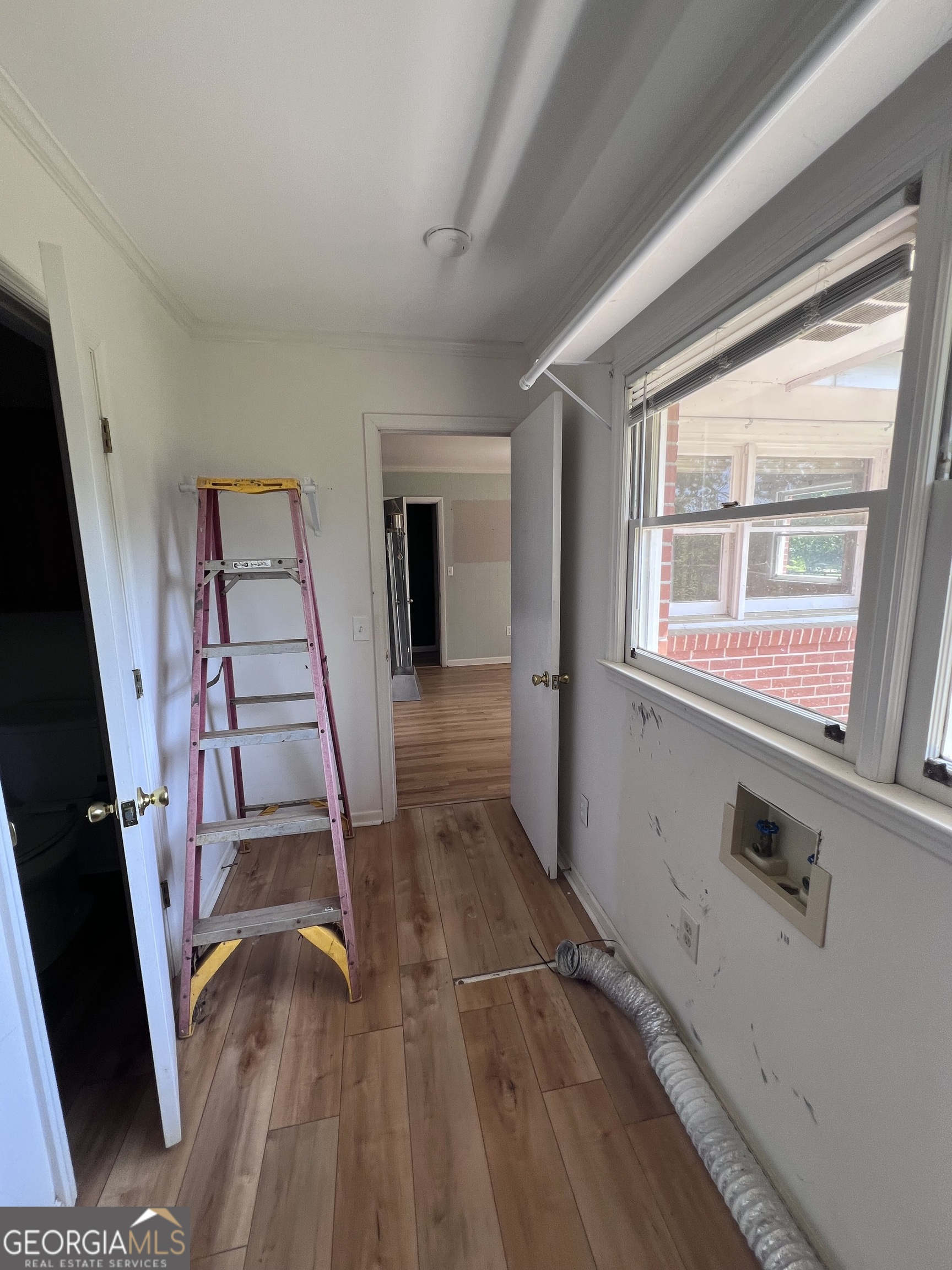 2205 Stonewall Street Dublin, GA 31021 - Photo 14 of 20 a view of an empty room with a window