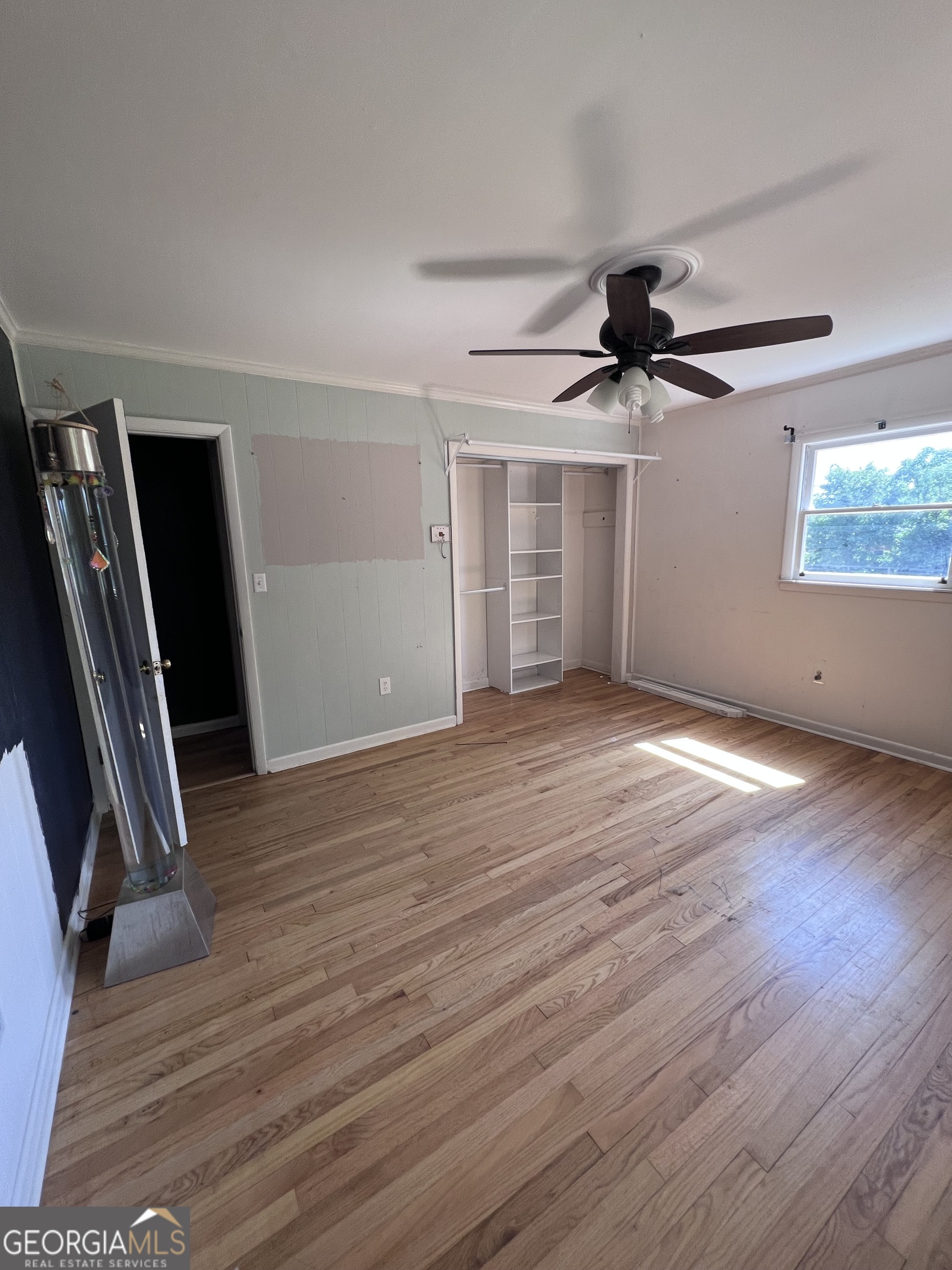 2205 Stonewall Street Dublin, GA 31021 - Photo 17 of 20 wooden floor in an empty room with a window