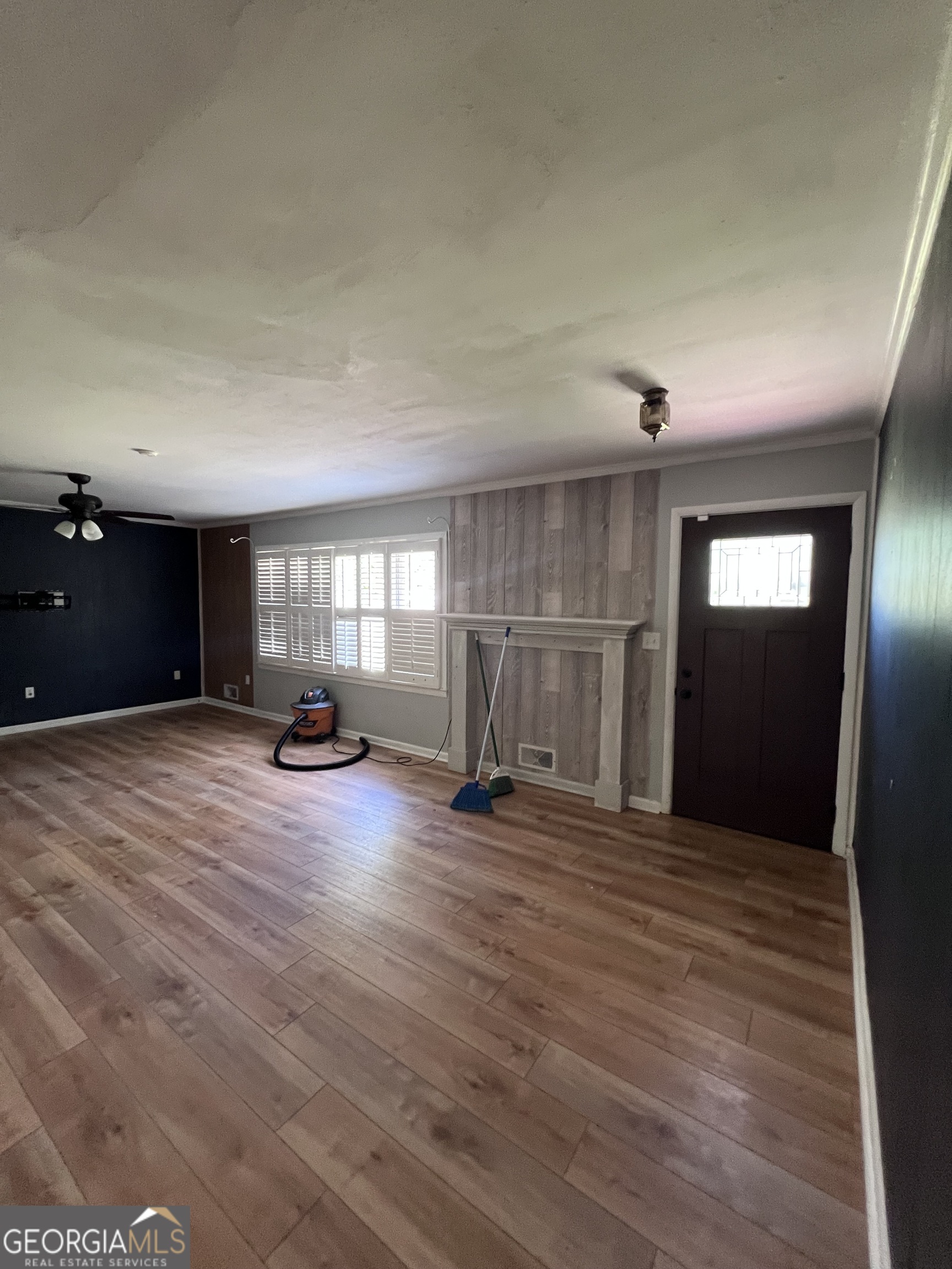 2205 Stonewall Street Dublin, GA 31021 - Photo 4 of 20 a view of empty room with wooden floor and window