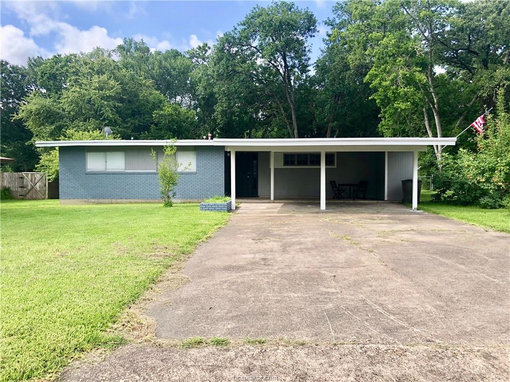 807 Vine Street Bryan, TX 77802 - Photo 1 of 17 a view of a house with a yard