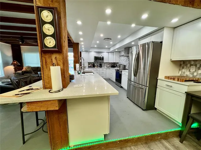 a living room with furniture and a couch