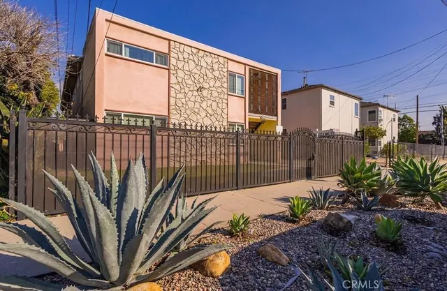 a house view with a garden space