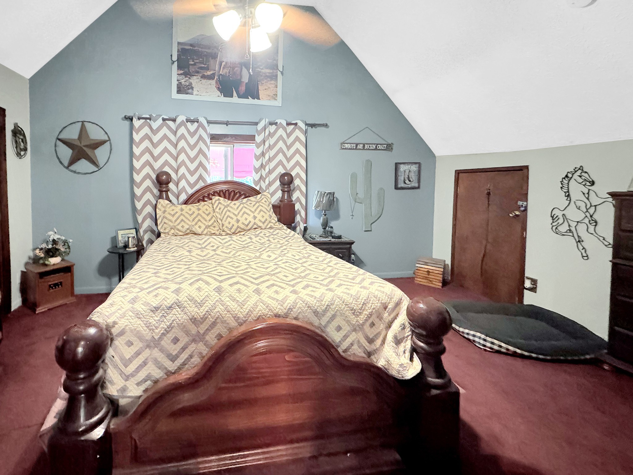 480 Hickman Shores Road Dover, TN 37058 - Photo 17 of 44 a bedroom with a bed and wooden floor