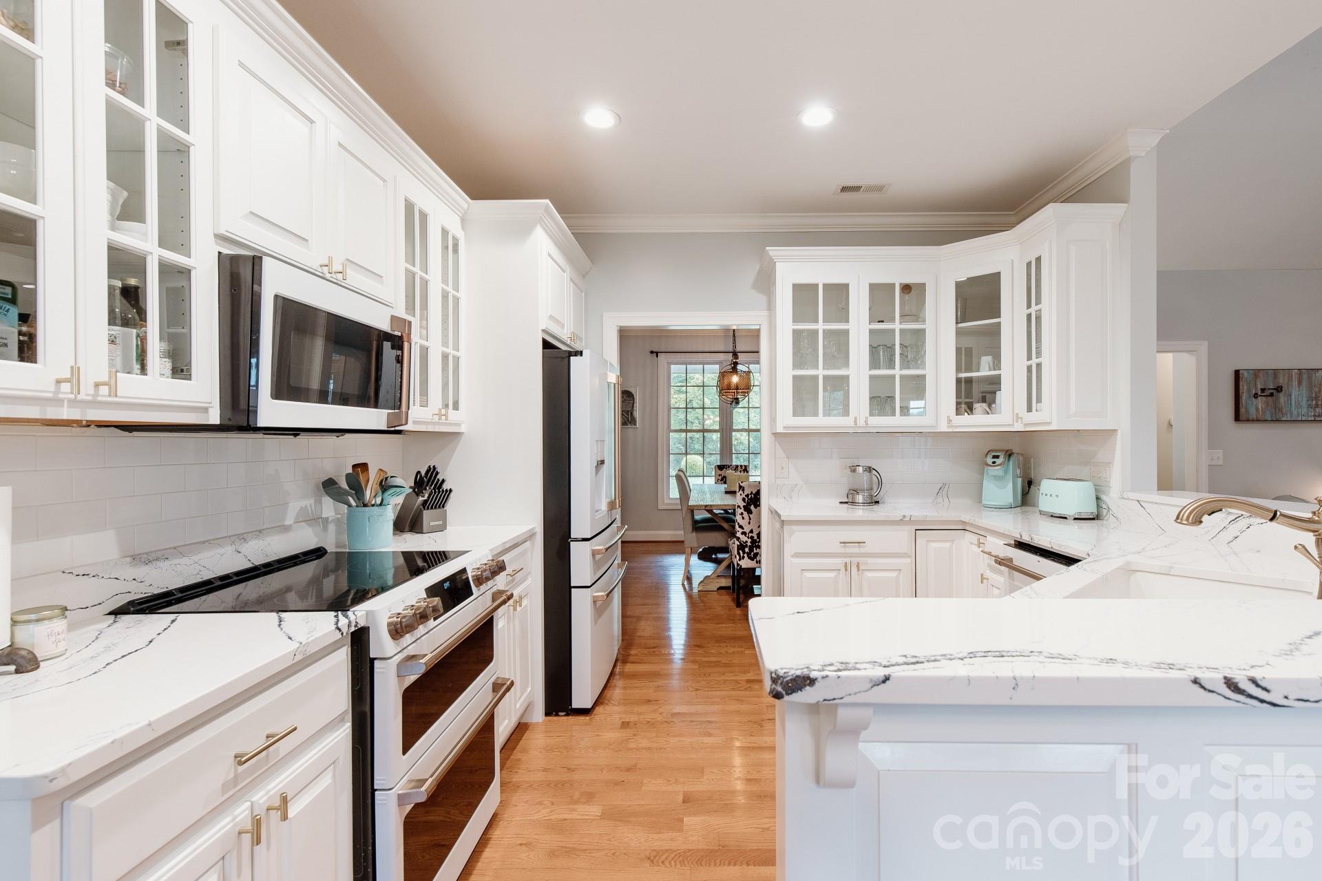 110 Mandy Lane Tryon, NC 28782 - Photo 12 of 48 a kitchen with a sink stove and cabinets