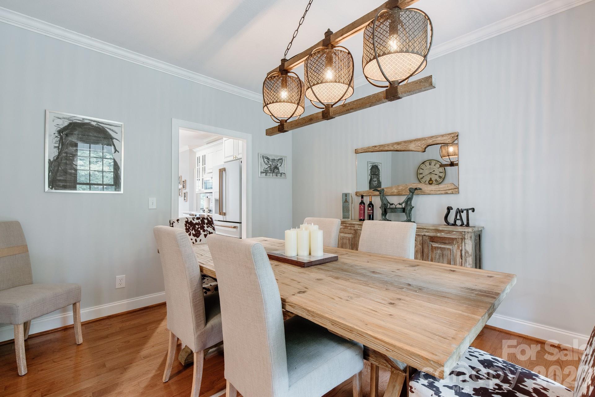 110 Mandy Lane Tryon, NC 28782 - Photo 20 of 48 a view of a dining room with furniture and wooden floor
