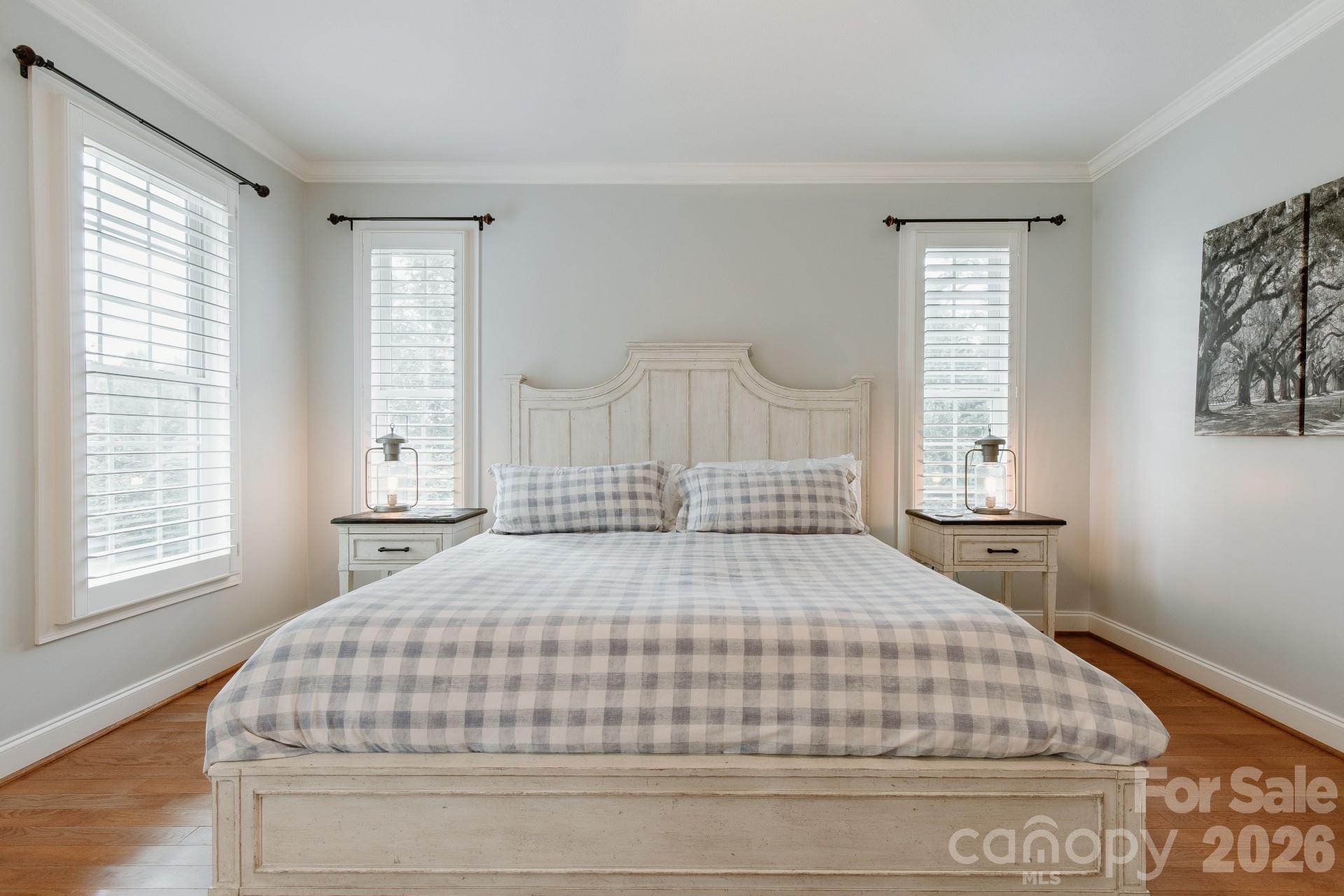 110 Mandy Lane Tryon, NC 28782 - Photo 23 of 48 a large bed sitting in a bedroom next to a window