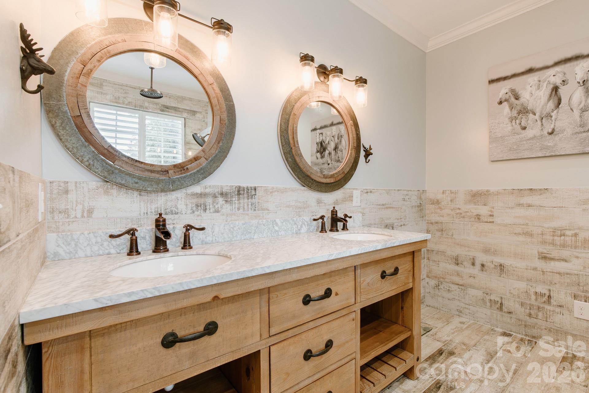 110 Mandy Lane Tryon, NC 28782 - Photo 25 of 48 a bathroom with a sink and a mirror