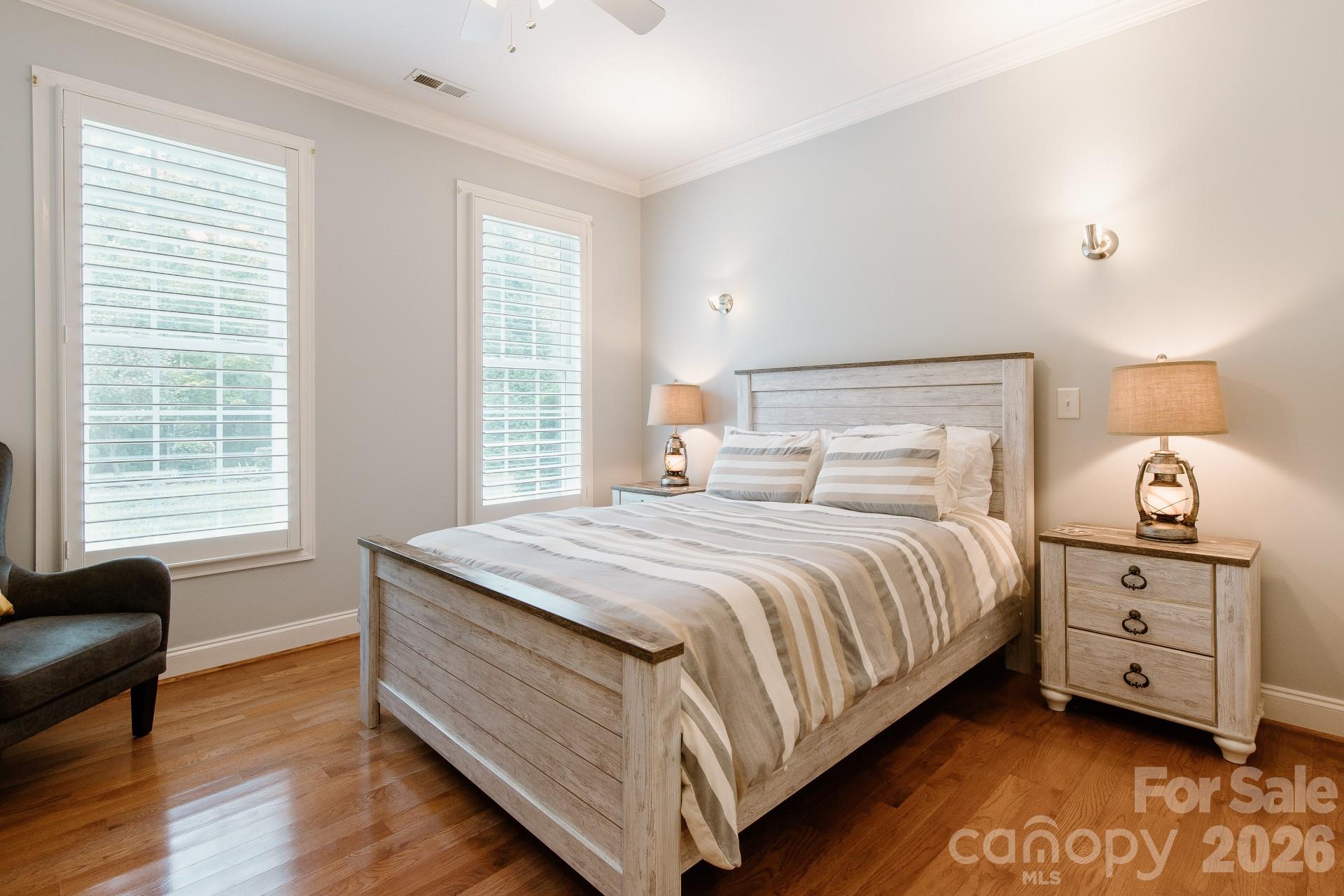 110 Mandy Lane Tryon, NC 28782 - Photo 27 of 48 a bedroom with a bed and a dresser