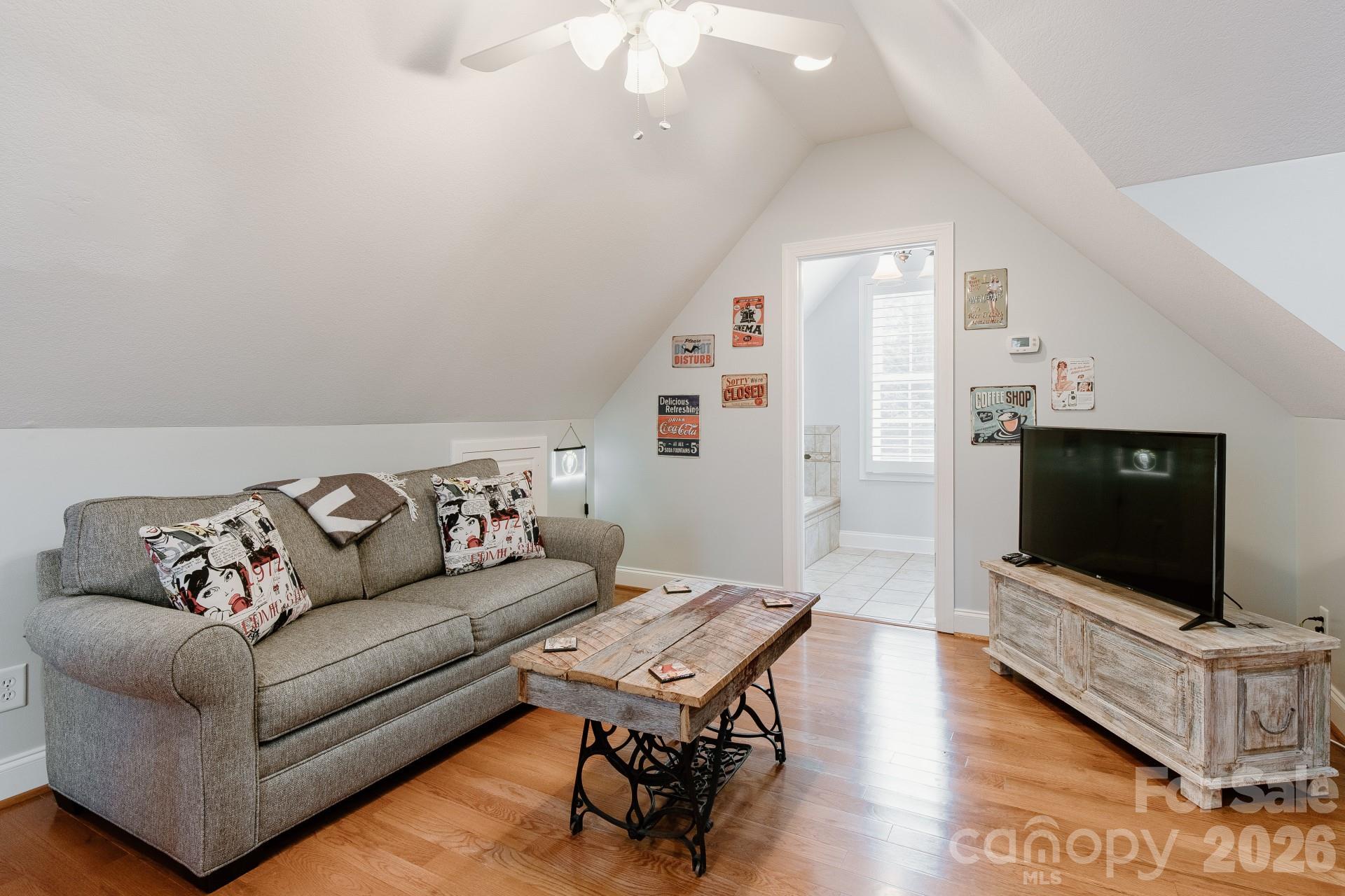 110 Mandy Lane Tryon, NC 28782 - Photo 36 of 48 a living room with furniture and a flat screen tv