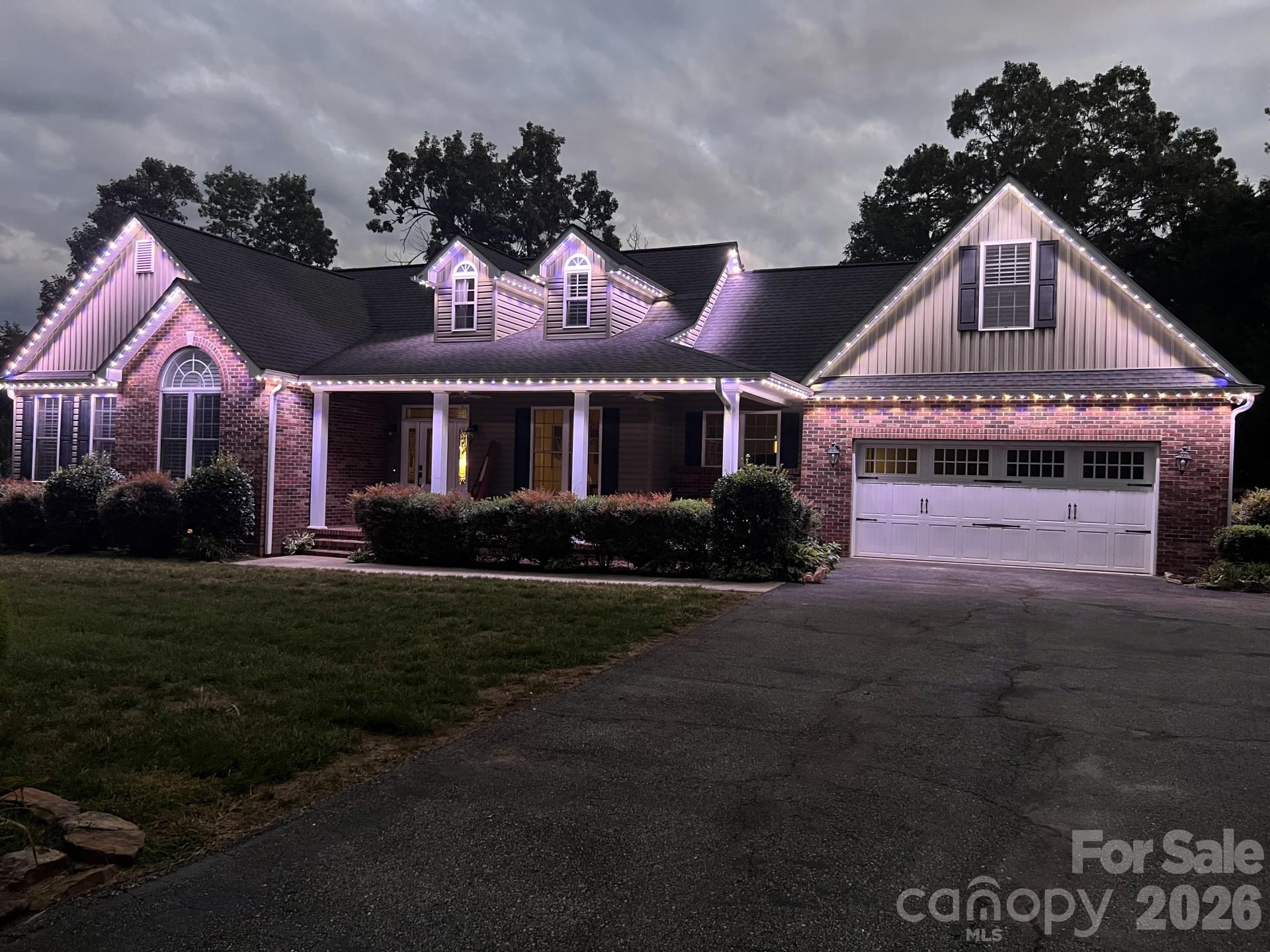 110 Mandy Lane Tryon, NC 28782 - Photo 44 of 48 a front view of a house with a garden