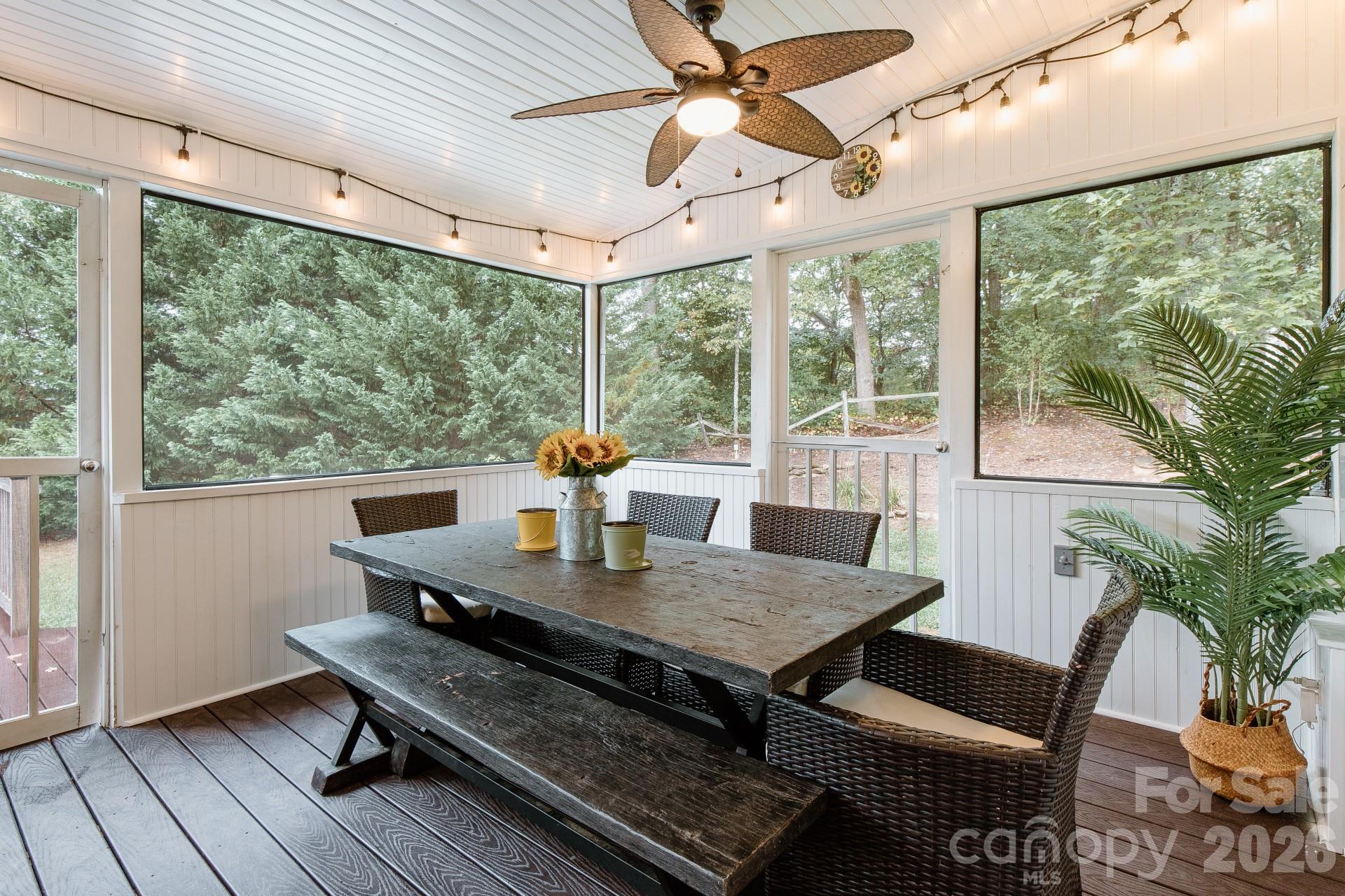 110 Mandy Lane Tryon, NC 28782 - Photo 9 of 48 a view of a dining room with furniture window and outside view