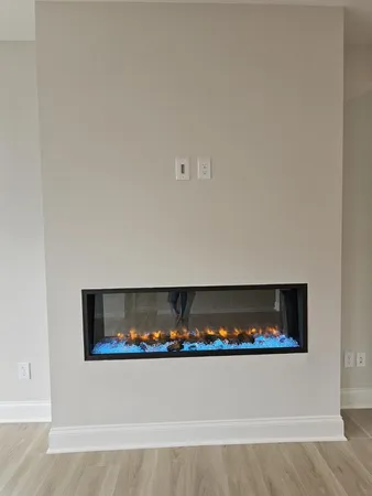a kitchen with stainless steel appliances granite countertop white cabinets and a sink
