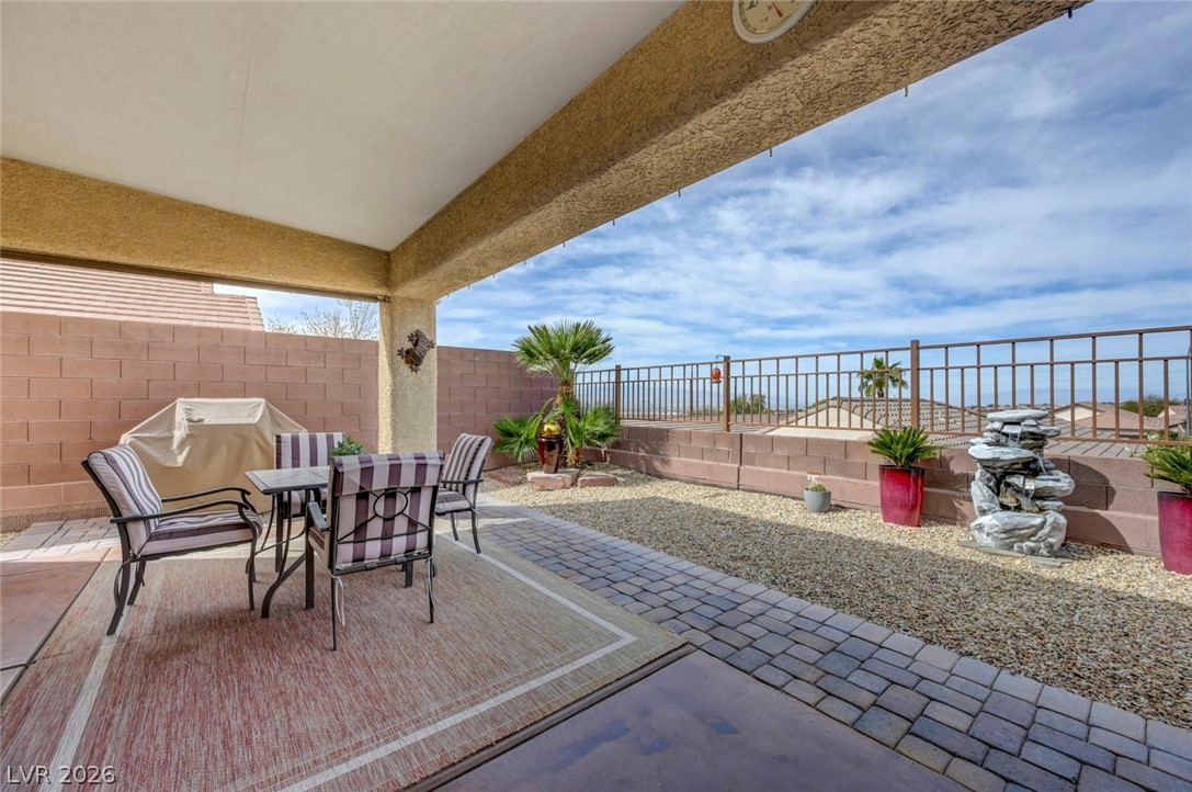 2700 Rue Montpellier Avenue Henderson, NV 89044 - Photo 31 of 39 Fenced backyard featuring outdoor dining space and a patio