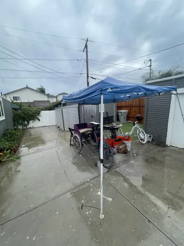 a view of a garage with parked cars