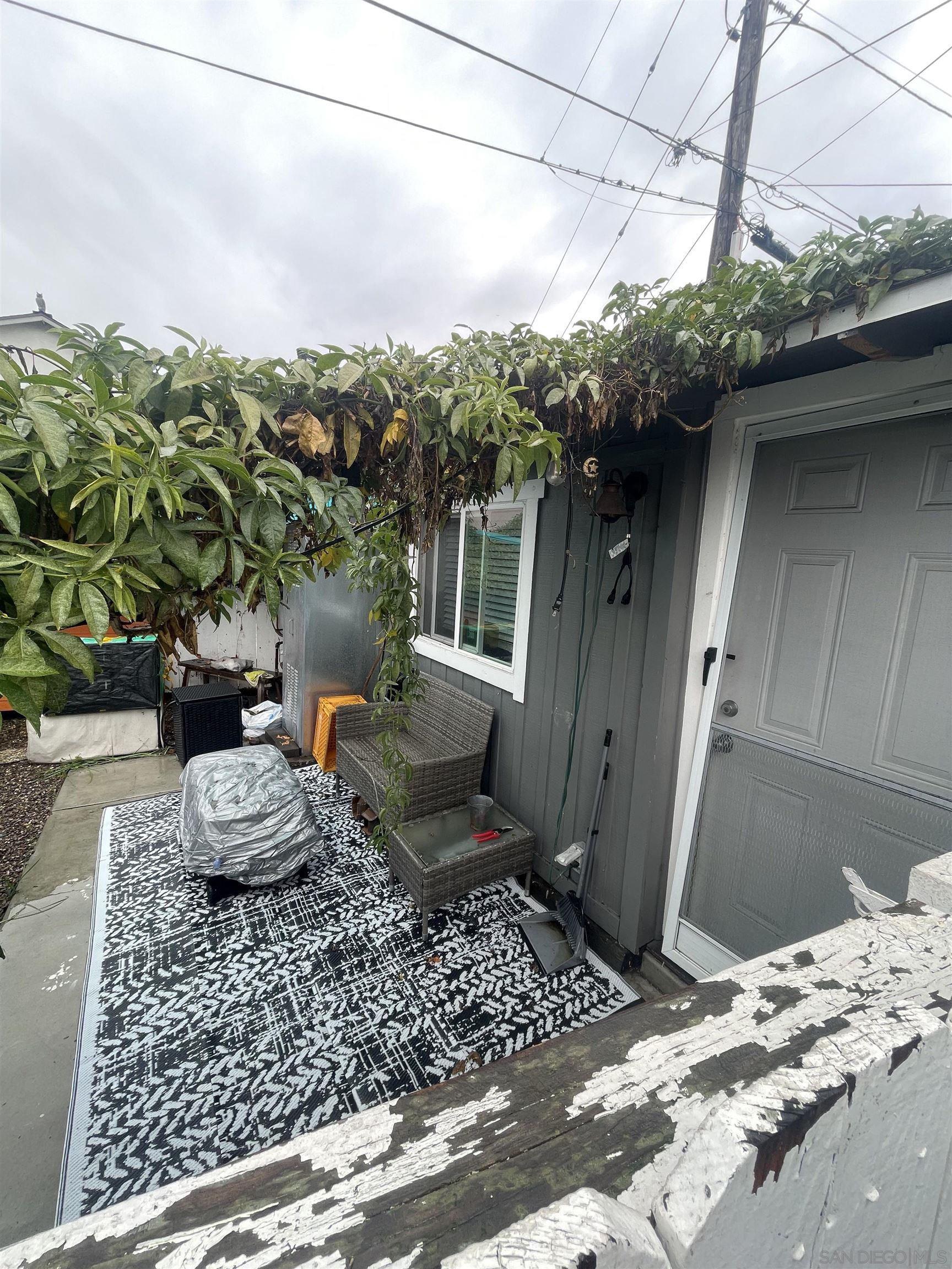 4667 35th Street San Diego, CA 92116 - Photo 21 of 29 a bathroom with a sink and a window