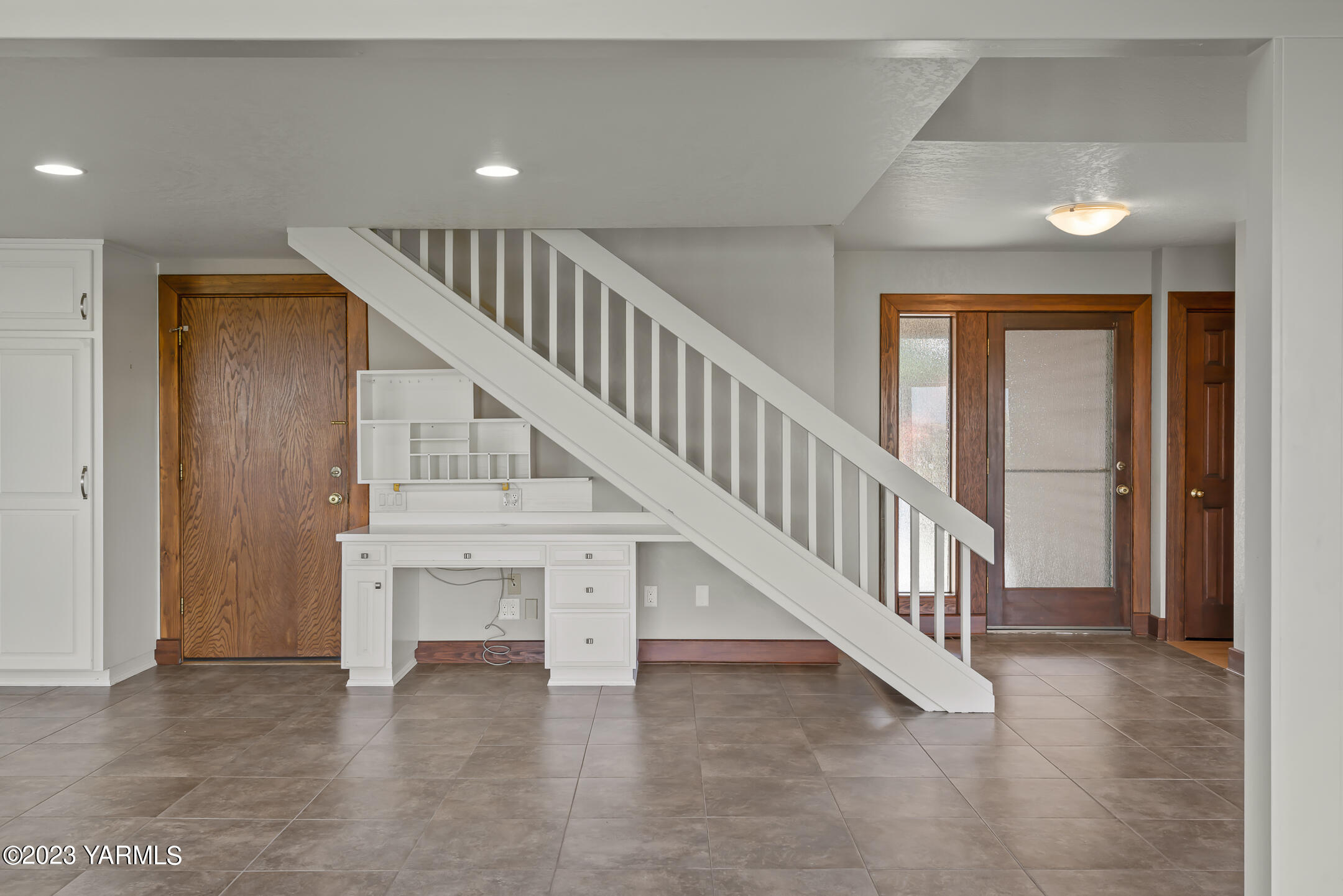 291 Orchard Street Yakima, WA 98908 - Photo 3 of 35 a view of staircase with white walls and windows