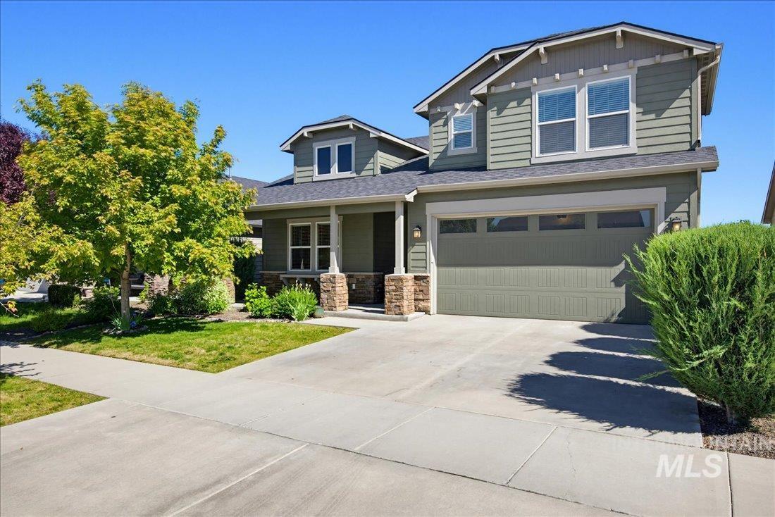 12460 West Azure Street Boise, ID 83713 - Photo 34 of 34 Two-story residence featuring green siding and a two-car garage