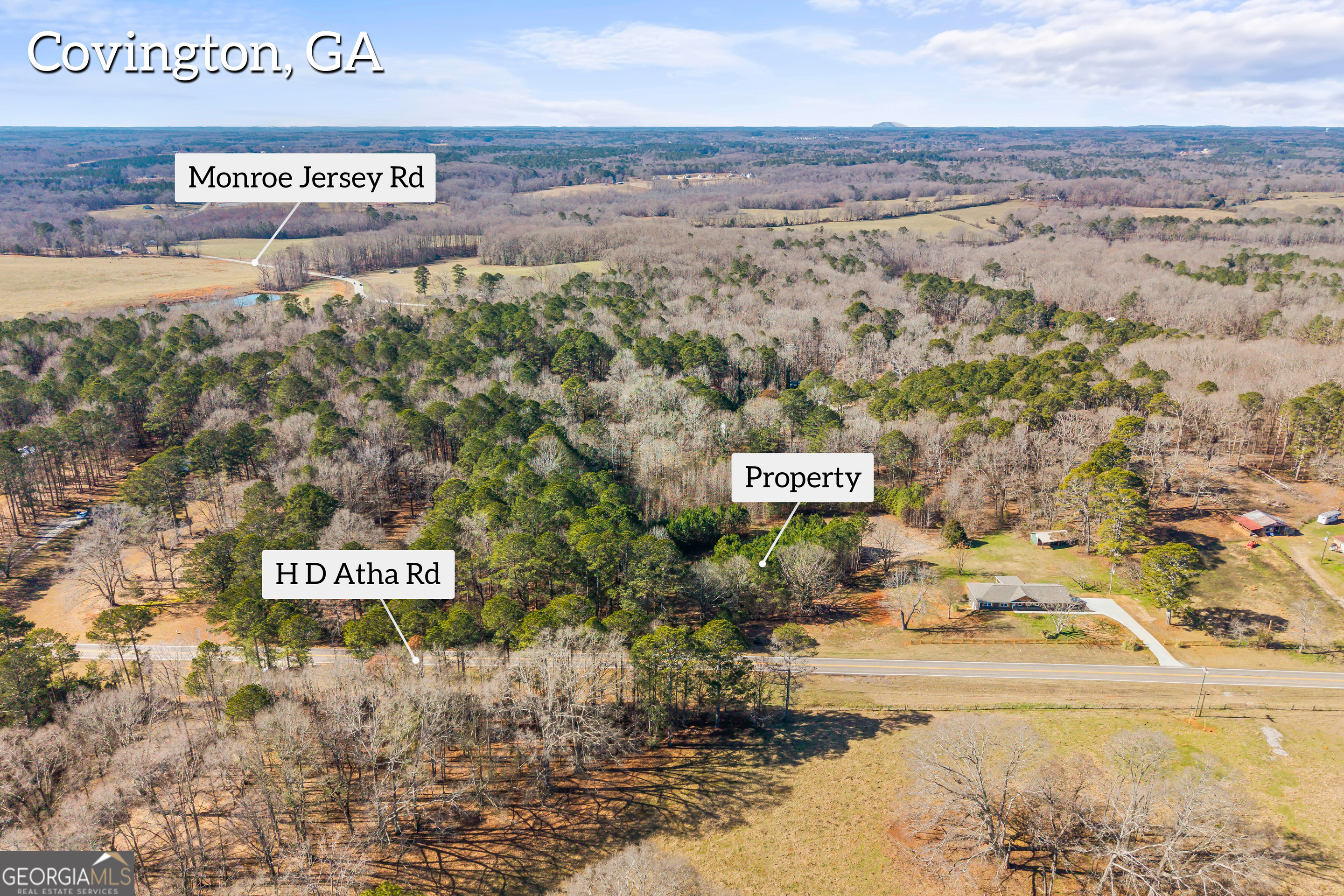 0 H D H D Atha Road Covington, GA 30014 - Photo 6 of 11 a view of a street with a building in the background