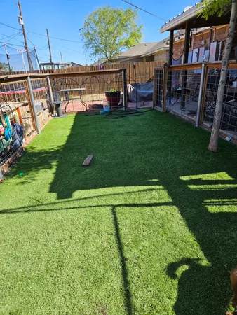 a view of a house with backyard