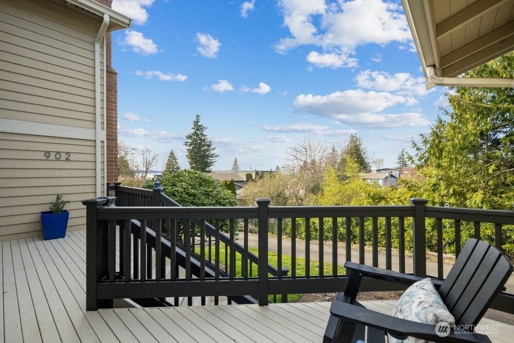 902 7th Avenue South Edmonds, WA 98020 - Photo 2 of 31 a view of a roof deck with wooden floor and fence