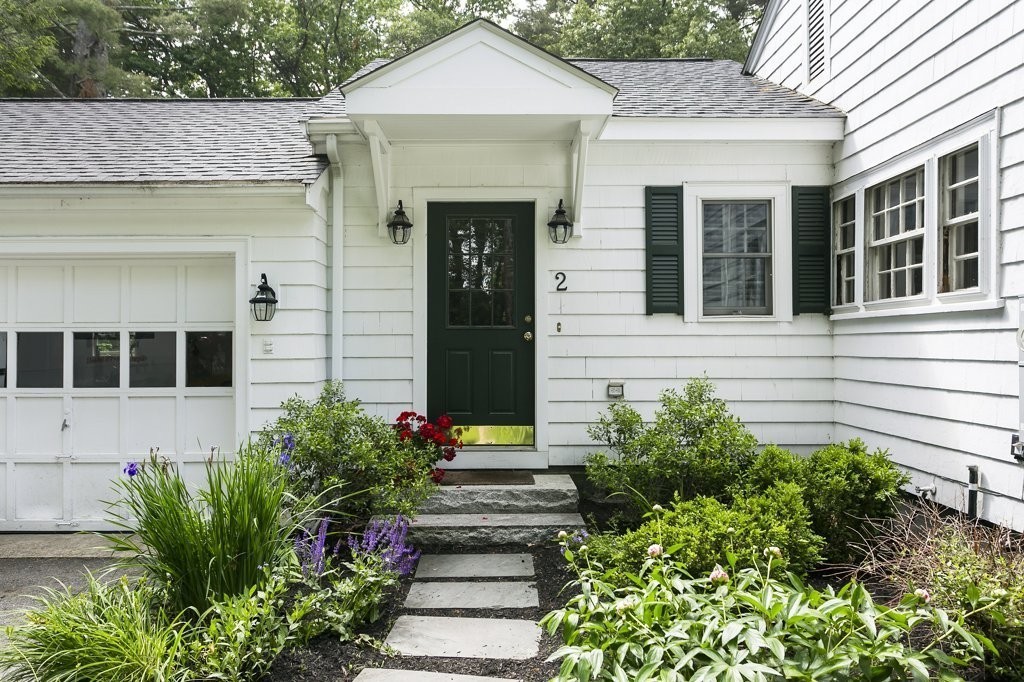 2 Wilson Road Concord, MA 01742 - Photo 1 of 19 a front view of a house with plants