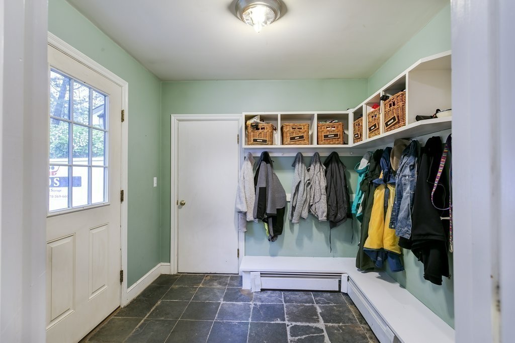 2 Wilson Road Concord, MA 01742 - Photo 12 of 19 a view of walk in closet with clothes and shoes