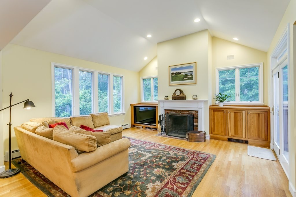 2 Wilson Road Concord, MA 01742 - Photo 4 of 19 a living room with furniture and a fireplace