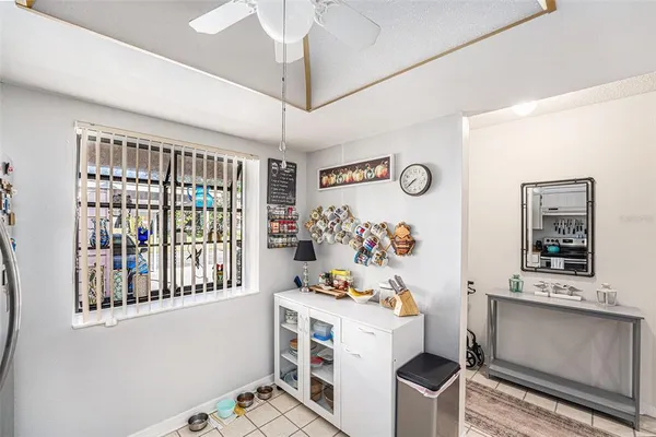 a kitchen with stainless steel appliances a refrigerator sink and cabinets