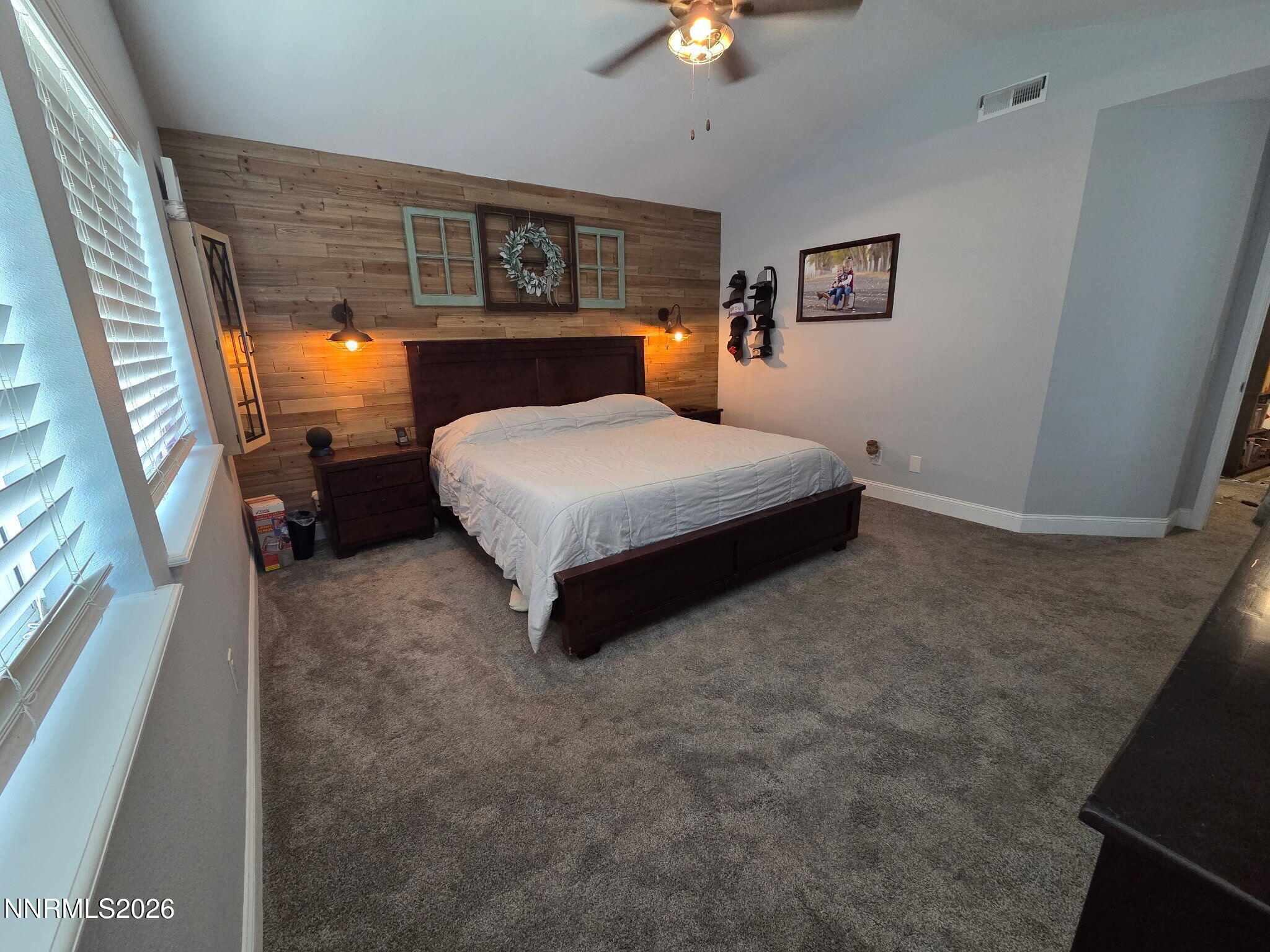1383 Rambling Wind Drive Fallon, NV 89406 - Photo 11 of 15 a bedroom with a bed and window