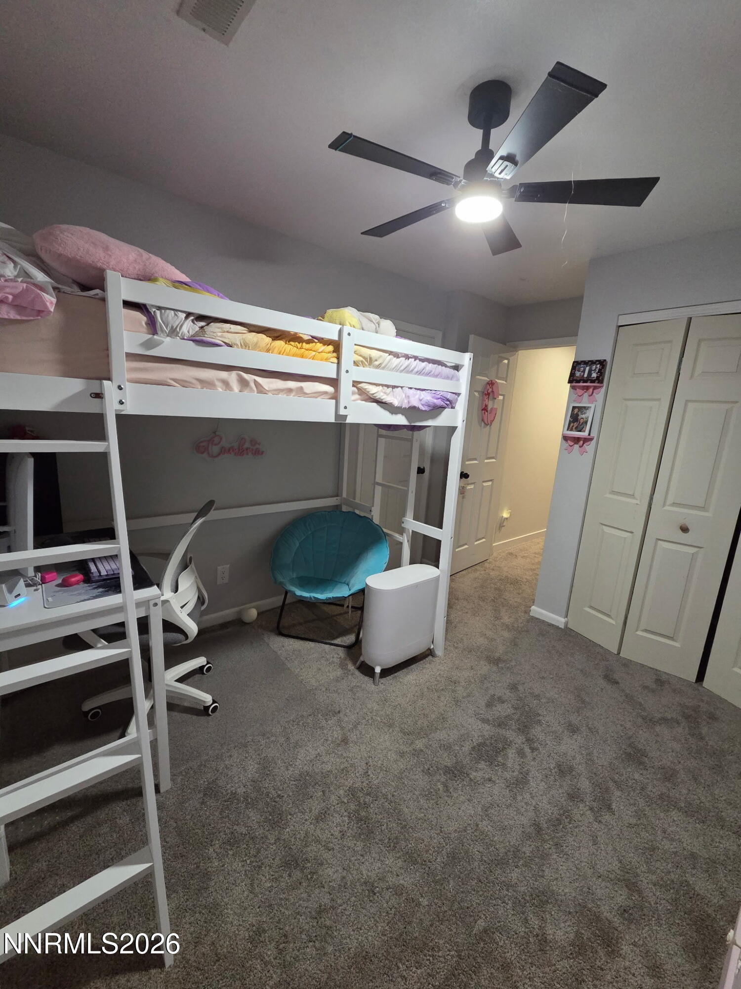 1383 Rambling Wind Drive Fallon, NV 89406 - Photo 14 of 15 a room with furniture and a flat screen tv