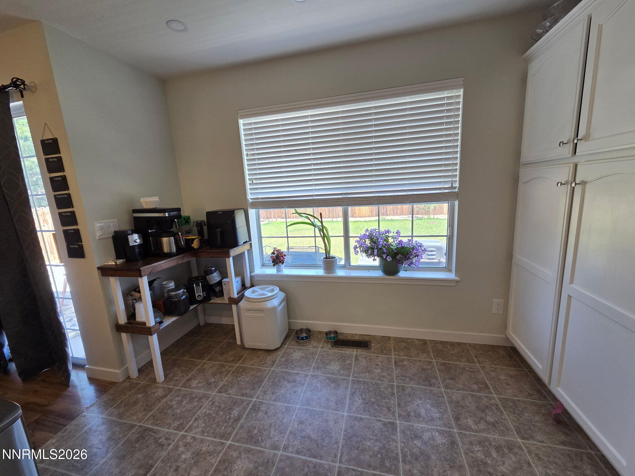 1383 Rambling Wind Drive Fallon, NV 89406 - Photo 5 of 15 a living room with furniture and a window