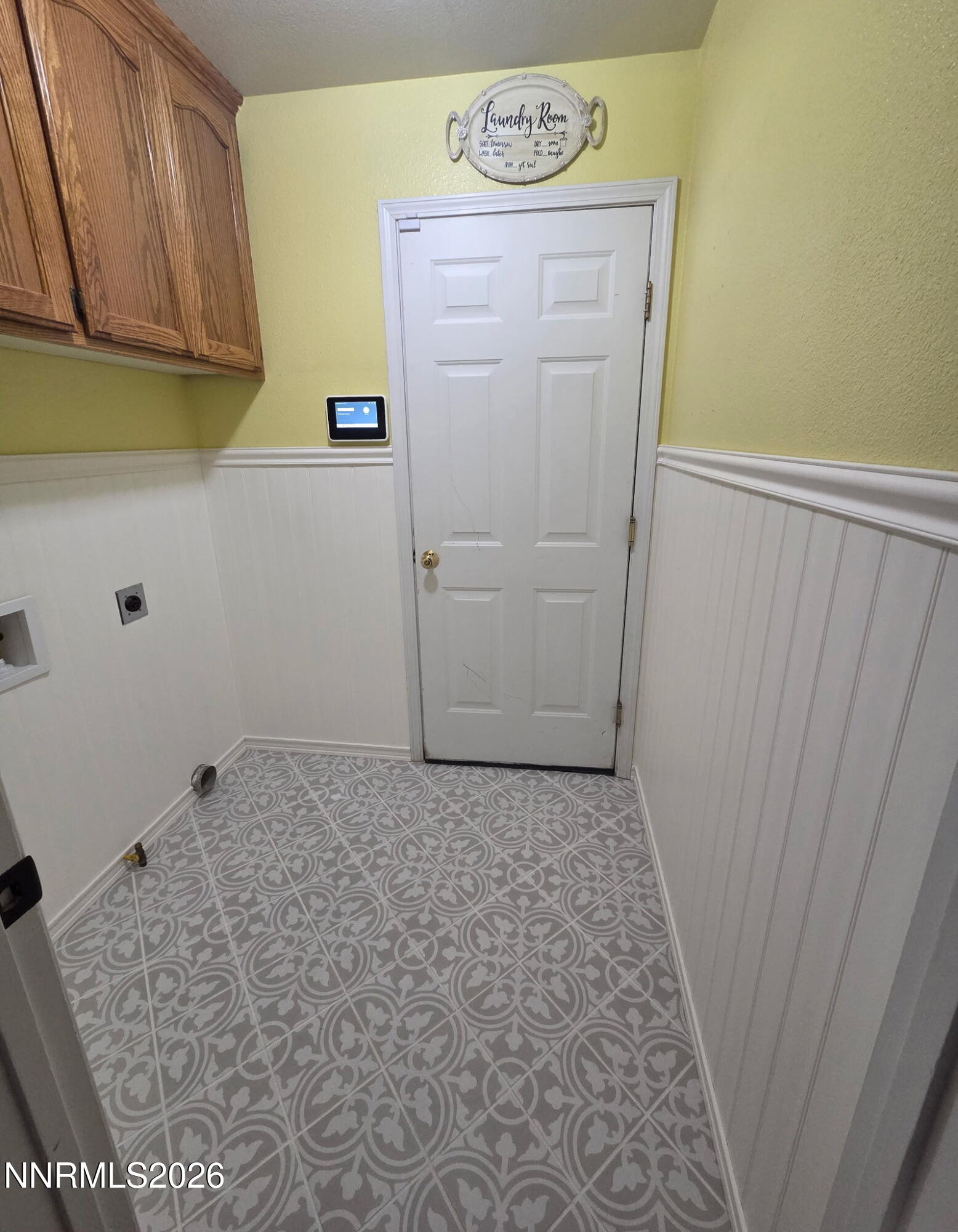 1383 Rambling Wind Drive Fallon, NV 89406 - Photo 7 of 15 a view of storage and utility room with a wooden floor