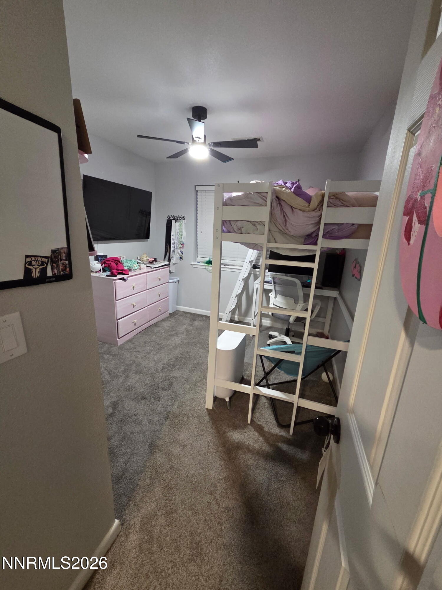 1383 Rambling Wind Drive Fallon, NV 89406 - Photo 9 of 15 a living room with furniture and a flat screen tv