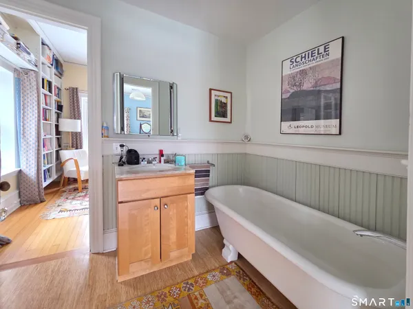 a very nice looking rest room with a large window