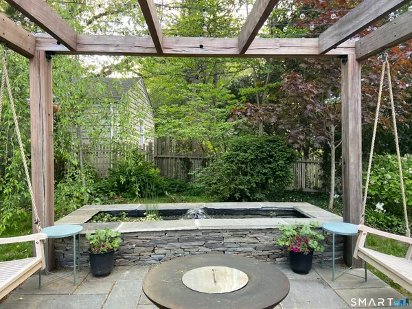 a view of house with yard