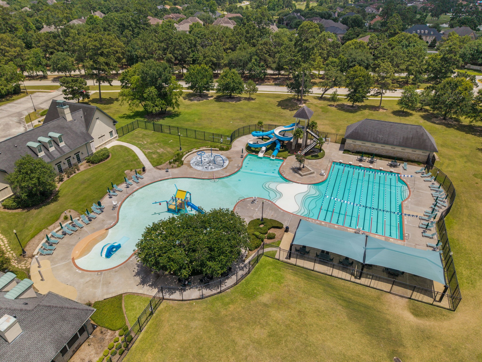 14718 Ramblebrook Humble, TX 77396 - Photo 32 of 38 Resort-style pools, water features, slides, cabana areas, and shaded spaces create one of Fall Creek’s signature lifestyle amenities.
Splash pads and water play areas add another layer of recreation within the community.