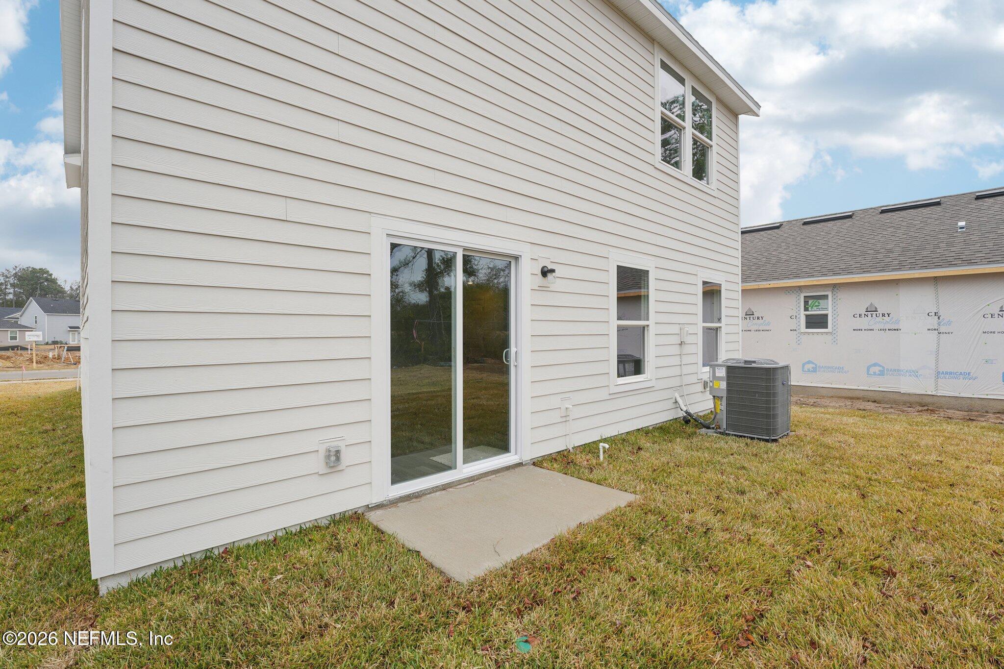 3547 Mildred Way Jacksonville, FL 32254 - Photo 6 of 13 a view of a house with a yard